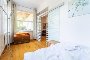 Ein Bett oder Betten in einem Zimmer der Unterkunft Achtern