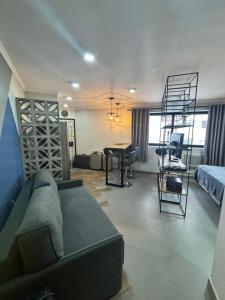 Ruang duduk di Hotel Biena Sena Madureira Vila Mariana com cozinha e garagem 1009 +12 gambar