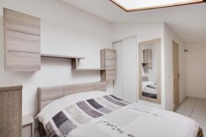 Postel nebo postele na pokoji v ubytování Duplex Alberti - Welkeys + 4 fotografie