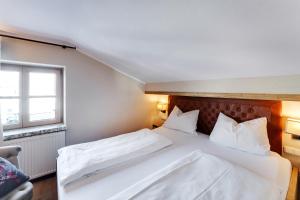 Łóżko lub łóżka w pokoju w obiekcie Design Apartment Villa Anna Kitzbühel