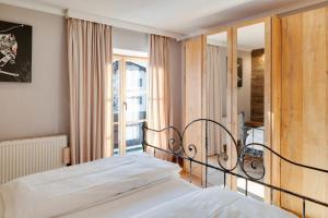 Łóżko lub łóżka w pokoju w obiekcie Design Apartment Villa Anna Kitzbühel