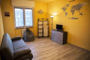 Televízia a/alebo spoločenská miestnosť v ubytovaní Casa Felice