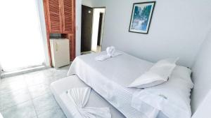 Postel nebo postele na pokoji v ubytování Miami Hotel