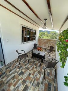 En balkon eller terrasse på Apaneca House