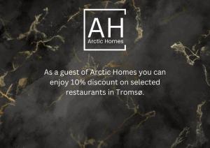 En logo, et sertifikat eller et firmaskilt på ARCTIC HOMES - Premium Aurora Apartment