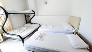Postel nebo postele na pokoji v ubytování Miami Hotel + 24 fotografií