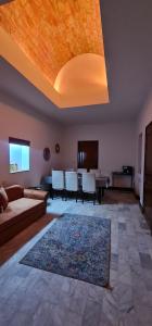 Posezení v ubytování Beit El Ezz - Les Suites
