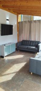Ruang duduk di Apartamento privado con entrada independiente en Caldes de Malavella