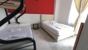 Postel nebo postele na pokoji v ubytování Miami Hotel