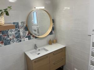 Et badeværelse på Charmante maison de famille