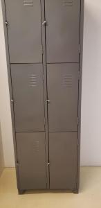 a pair of metal lockers in a room at Jardim Secreto in Sao Paulo