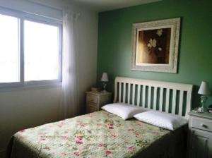 Ένα ή περισσότερα κρεβάτια σε δωμάτιο στο Venha Curtir suas Ferias no Condominio Pacífic