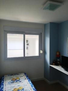 Ένα ή περισσότερα κρεβάτια σε δωμάτιο στο Venha Curtir suas Ferias no Condominio Pacífic