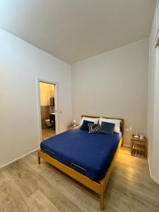 Postel nebo postele na pokoji v ubytování Malila's-Cipitelli San Pietro