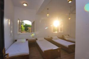 Ένα ή περισσότερα κρεβάτια σε δωμάτιο στο Eternal Nile Guest House