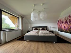 Ένα ή περισσότερα κρεβάτια σε δωμάτιο στο Lavendelhaus