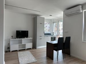 TV a/nebo společenská místnost v ubytování Studio Y