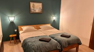 Postel nebo postele na pokoji v ubytování Jagerheim Apartments Flattach