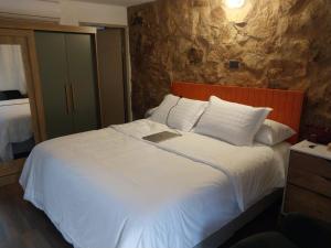 Postelja oz. postelje v sobi nastanitve Casita de Piedra