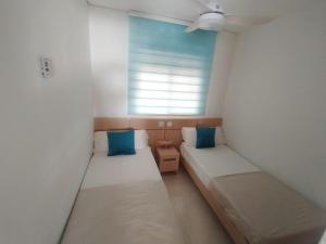 Postel nebo postele na pokoji v ubytování Edificio Costa Azahar II + 15 fotografií