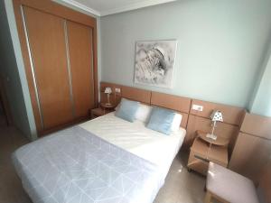 Postel nebo postele na pokoji v ubytování Edificio Costa Azahar II
