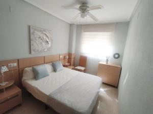 Postel nebo postele na pokoji v ubytování Edificio Costa Azahar II