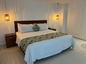 Postel nebo postele na pokoji v ubytování Hotel Playa Club
