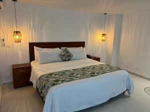 Postel nebo postele na pokoji v ubytování Hotel Playa Club