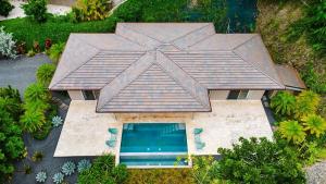 an overhead view of a house with a swimming pool at Exclusive Villa in Mar Vista Community in Playa Flamingo