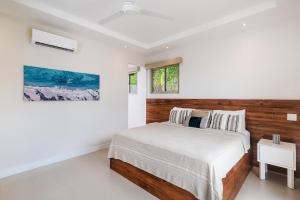 Ένα ή περισσότερα κρεβάτια σε δωμάτιο στο Exclusive Villa in Mar Vista Community