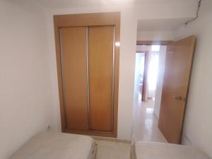 Postel nebo postele na pokoji v ubytování Edificio Costa Azahar II