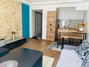 Kuchyň nebo kuchyňský kout v ubytování Apartmani N&D