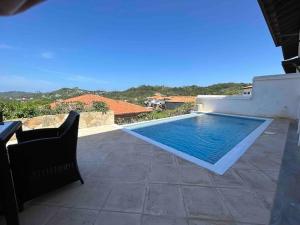 Πισίνα στο ή κοντά στο SLOW M OCEAN VIEWS Golf Course