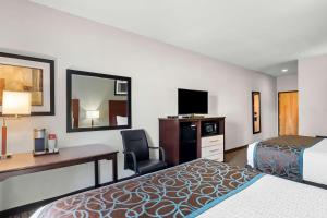 Postel nebo postele na pokoji v ubytování Best Western Plus - Magee Inn & Suites