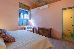 Postel nebo postele na pokoji v ubytování Casa la batuta