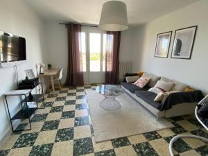 Posezení v ubytování Maison T3 près de Toulouse