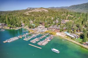 an aerial view of a resort with a marina at Cottage Like Suite with Private Hot Tub in Bass Lake