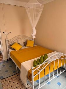 Una cama o camas en una habitación de Welcome to Schoelcher!