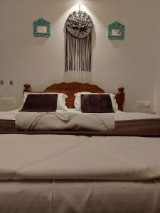 Letto o letti in una camera di Goan Hideaway Uno