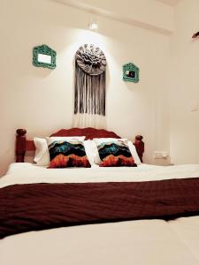 Letto o letti in una camera di Goan Hideaway Uno