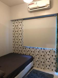 Katil atau katil-katil dalam bilik di 1br with balcony 30flr T4