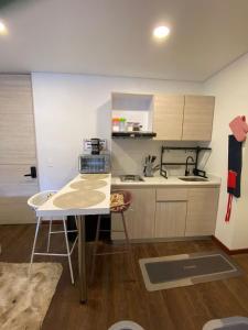 Kuchyň nebo kuchyňský kout v ubytování Tu lugar perfecto 80