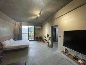 TV a/nebo společenská místnost v ubytování 沐目家 Xiang Jia Homestay