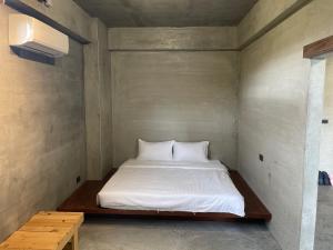 Postel nebo postele na pokoji v ubytování 沐目家 Xiang Jia Homestay