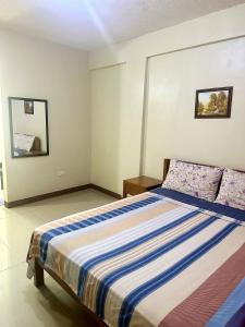 Katil atau katil-katil dalam bilik di JEMZ Tagaytay Budget Rooms