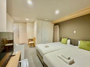 Postel nebo postele na pokoji v ubytování Y&Y NAMBA HOTEL Osaka + 37 fotografií