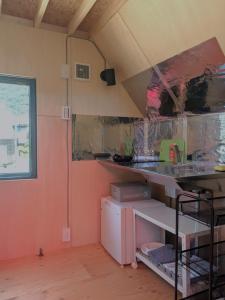 Kuchyň nebo kuchyňský kout v ubytování Tiny House ZEN 倉橋島