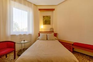 Postel nebo postele na pokoji v ubytování Pažaislis Park Hotel