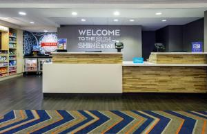 a welcome to the sun shine sign in a store at Hampton Inn & Suites Tallahassee I-10-Thomasville Road in Tallahassee