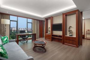 TV in/ali zabaviščno središče v nastanitvi Wyndham Garden Foshan Nanhai